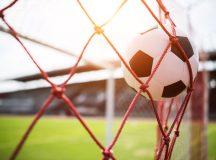 Soccer into goal success concept